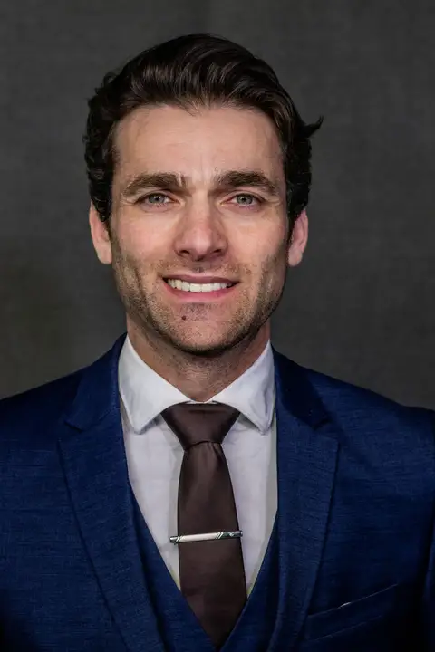 Professional headshot by By Ender Photography